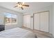 Relaxing bedroom offering natural light, a ceiling fan, and ample closet space at 540 N May -- # 2110, Mesa, AZ 85201