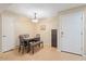 Cozy dining area includes a pendant light, seating for four, and a convenient coat closet at 540 N May -- # 2110, Mesa, AZ 85201