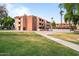 Condominium building with a large green lawn at 540 N May -- # 2110, Mesa, AZ 85201