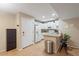 Eat-in kitchen features a breakfast bar, granite countertops, and white appliances at 540 N May -- # 2110, Mesa, AZ 85201