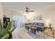 Comfortable living room with natural light, ceiling fan, and a view to the outdoor space at 540 N May -- # 2110, Mesa, AZ 85201