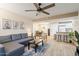 Comfortable living room leading to the eat-in kitchen, dining area, and features modern décor at 540 N May -- # 2110, Mesa, AZ 85201