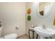 Powder room featuring a pedestal sink and modern decorations at 5445 E Mckellips Rd # 48, Mesa, AZ 85215