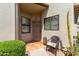 Welcoming front porch with seating and stylish decor creates a warm entry at 5445 E Mckellips Rd # 48, Mesa, AZ 85215