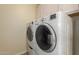 Laundry room with white side-by-side washer and dryer at 5445 E Mckellips Rd # 48, Mesa, AZ 85215