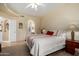 Comfortable primary bedroom featuring arched entryway to the bathroom at 5445 E Mckellips Rd # 48, Mesa, AZ 85215