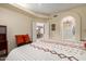 Spacious primary bedroom with a glimpse into the en-suite bathroom and dining area at 5445 E Mckellips Rd # 48, Mesa, AZ 85215