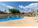 Outdoor community pool with a jacuzzi and a lounging area at 5445 E Mckellips Rd # 48, Mesa, AZ 85215