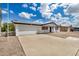 Inviting single-story home featuring a two-car garage and a low-maintenance yard, ideal for comfortable living at 5818 E Colby St, Mesa, AZ 85205