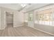 Bright sunroom area with fan, access to a doorway and outdoor access at 5818 E Colby St, Mesa, AZ 85205