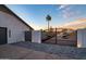 Private gated entrance with custom metalwork and desert-inspired details, enhancing curb appeal at 5922 W Michelle Dr, Glendale, AZ 85308