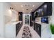 Beautiful kitchen featuring stainless steel appliances, navy cabinets, and white countertops at 5922 W Michelle Dr, Glendale, AZ 85308