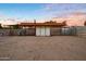 Wide angle shot of the lot with large building and open space at 5922 W Michelle Dr, Glendale, AZ 85308
