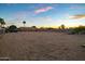 Wide angle shot of the lot at twilight with extensive space and privacy at 5922 W Michelle Dr, Glendale, AZ 85308
