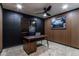 Modern office with a sleek desk, custom wood trim, and stylish decor at 5922 W Michelle Dr, Glendale, AZ 85308