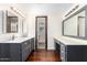 Bright bathroom featuring double sinks and vanity area with lots of storage space at 5926 S Newberry Rd, Tempe, AZ 85283