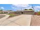 Home with a brick facade, a two-car garage, and a concrete driveway at 5926 S Newberry Rd, Tempe, AZ 85283