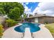 Inviting backyard pool with diving board and patio, perfect for outdoor entertaining at 5926 S Newberry Rd, Tempe, AZ 85283