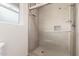 This bathroom features a clean and modern shower with glass door and tiled interior at 5926 S Newberry Rd, Tempe, AZ 85283
