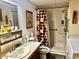Practical bathroom with a clean design, essential fixtures, and a well-maintained shower area at 5933 E Main St # 114, Mesa, AZ 85206