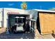Exterior featuring vehicle storage and a golf cart, set against a clear blue sky at 5933 E Main St # 114, Mesa, AZ 85206