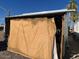 Exterior shot showing covered vehicle storage on gravel, with desert landscaping at 5933 E Main St # 114, Mesa, AZ 85206