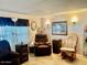 Cozy living room with comfortable seating, natural light, and a relaxing atmosphere for everyday living at 5933 E Main St # 114, Mesa, AZ 85206