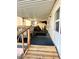 View of a covered patio featuring seating and backyard storage at 5933 E Main St # 114, Mesa, AZ 85206