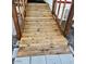 Exterior shot of wooden ramp offering accessible entry to home at 5933 E Main St # 114, Mesa, AZ 85206