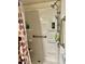 Accessible shower features grab bars, shelves, and a handheld shower head at 5933 E Main St # 114, Mesa, AZ 85206