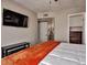 Bedroom with dark wood furniture, and an attached ensuite bathroom at 5995 N 78Th St # 1047, Scottsdale, AZ 85250