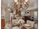 Inviting dining room with chandelier, connected to the kitchen and living area; perfect for gatherings at 5995 N 78Th St # 1047, Scottsdale, AZ 85250