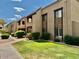 Well-maintained townhome exteriors with green lawns and mature landscaping at 5995 N 78Th St # 1047, Scottsdale, AZ 85250