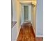 Hallway with wood-look flooring leading to various rooms in the home at 5995 N 78Th St # 1047, Scottsdale, AZ 85250