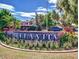 Community entrance sign with lush landscaping and manicured grounds at 5995 N 78Th St # 1047, Scottsdale, AZ 85250