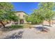 Large backyard featuring a well kept lawn and mature trees at 6811 W Darrel Rd, Laveen, AZ 85339