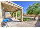 Spacious backyard patio with ample seating area, perfect for outdoor entertaining at 6811 W Darrel Rd, Laveen, AZ 85339
