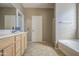Bathroom with separate tub and shower at 6811 W Darrel Rd, Laveen, AZ 85339