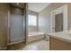 Bathroom with a separate shower and soaking tub at 6811 W Darrel Rd, Laveen, AZ 85339