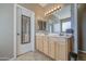 Bathroom with double vanity and large mirrors at 6811 W Darrel Rd, Laveen, AZ 85339