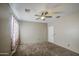 Bedroom with carpeting and a ceiling fan at 6811 W Darrel Rd, Laveen, AZ 85339