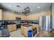Kitchen with granite countertops, stainless steel appliances and light wood cabinetry at 6811 W Darrel Rd, Laveen, AZ 85339