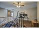 Second-floor loft boasts wood-look floors, ceiling fan, natural light and overlooks the backyard at 6811 W Darrel Rd, Laveen, AZ 85339