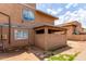 View of the exterior, featuring a back patio and showcasing the architecture of the community at 6901 W Mackenzie Dr # 1287, Phoenix, AZ 85033
