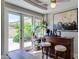 Cozy breakfast nook area with a coffee bar, views of the patio, and bright natural light at 8830 S 20Th S Pl, Phoenix, AZ 85042