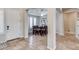 Inviting dining room features travertine floors, a tray ceiling, and an abundance of natural light at 8830 S 20Th S Pl, Phoenix, AZ 85042