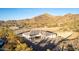 Luxury home with mountain views, private drive, and desert landscaping in a scenic location at 9357 W Canyon Verde Dr, Casa Grande, AZ 85194
