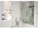 Contemporary bathroom featuring a glass shower, toilet, and marble floors at 9357 W Canyon Verde Dr, Casa Grande, AZ 85194