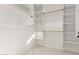 Spacious closet featuring custom white shelving and clothing rods at 9357 W Canyon Verde Dr, Casa Grande, AZ 85194