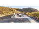 Stunning exterior of a modern home with a desert landscape, showcasing its architectural design at 9357 W Canyon Verde Dr, Casa Grande, AZ 85194